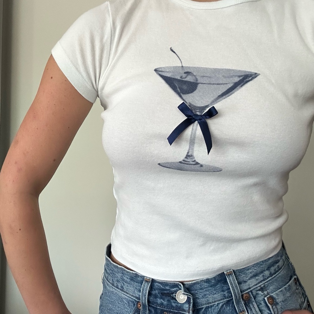 Subdued Graphic Tee with Martini Blue Bow Detail🍸